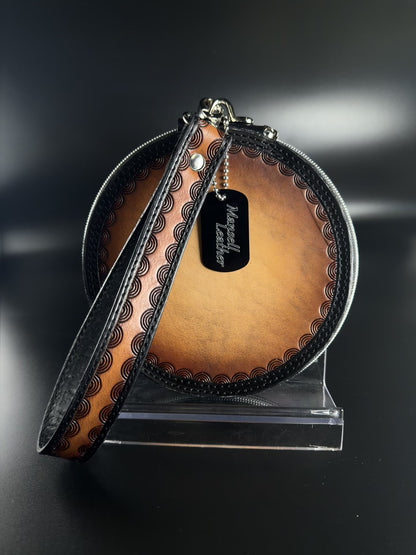 leather tatoo style round wristlet